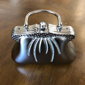 Silver studded hand clutch